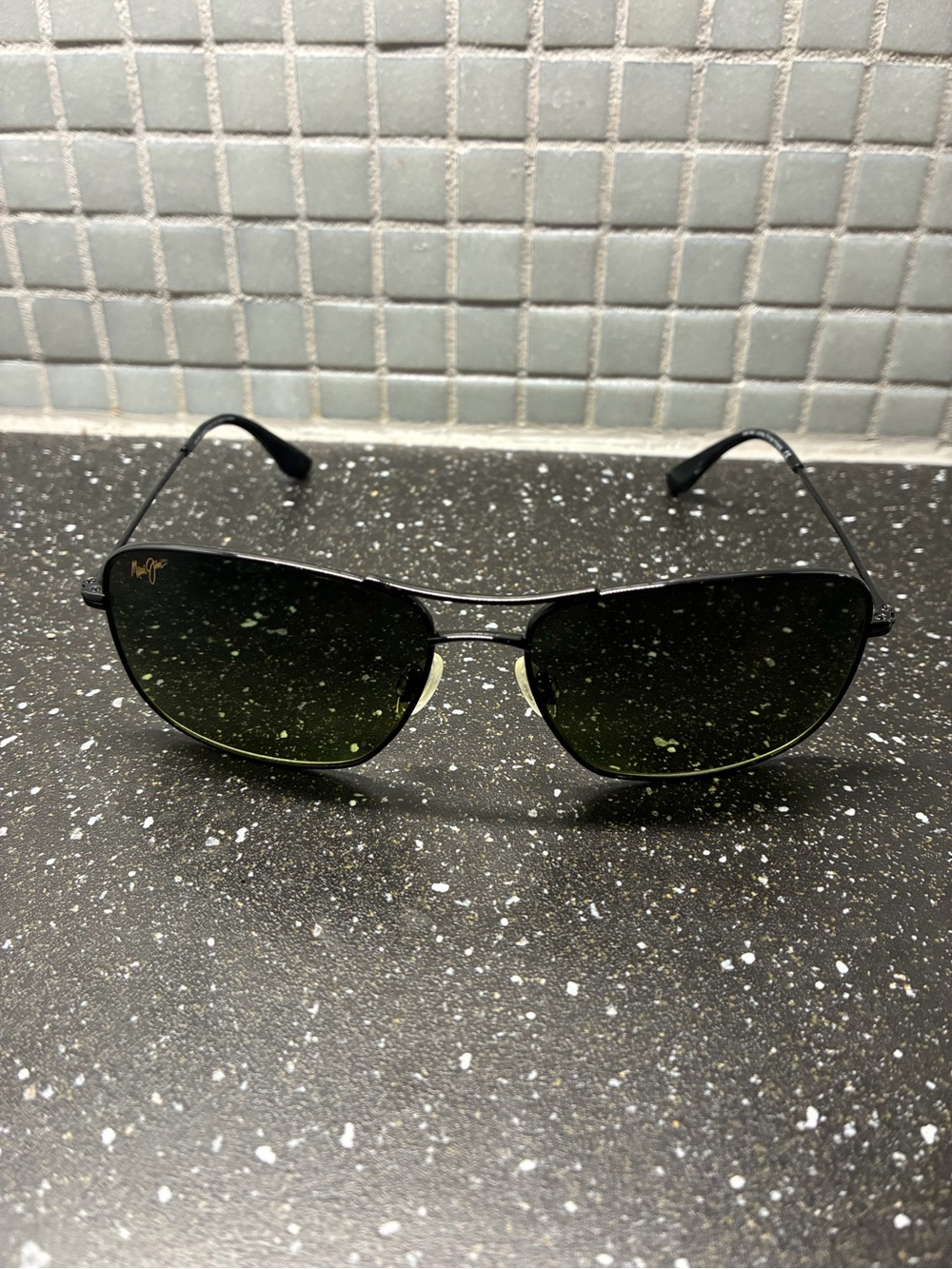 Maui Jim Black Frame Sunglasses with Green Lenses